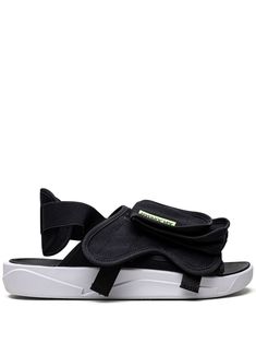 black/white/ghost green tonal stitching open toe front flap pocket elasticated slingback strap touch-strap fastening branded insole rubber sole Black Sport Sandals With Adjustable Strap For Spring, Black Slingback Sport Sandals With Adjustable Strap, Modern Black Slingback Sport Sandals, Black Slides With Adjustable Strap For Spring, Casual Black Sandals With Logo Strap, Sporty Nylon Sport Sandals For Streetwear, Black Synthetic Slingback Sport Sandals, Nylon Sandals For Summer Streetwear, Black Nylon Sandals With Cushioned Footbed