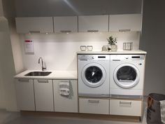 a washer and dryer in a small room