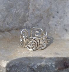 "✧ Greek key and spiral combo hammered ring in Sterling silver by BIOS jewelry ✧ ◆ This delicate adjustable ring handmade with care in our workshop in Greece, features the Meander or Greek key motifand spiral two of the most beautiful and important symbols in Ancient Greece. ◆ The continuous interlocking lines and repeated motif reflects the fluid movement of the ocean wave, and thus the eternal flow of things, the meandering of life. ≈ Greek key symbolizes ◆ Unity ◆ Infinity ◆ Everlasting bonds Ring Symbolism, Spiral Jewelry, Greek Ring, Fluid Movement, Hammered Jewelry, Wife Jewelry, Unique Silver Jewelry, Spiral Ring, Hammered Ring