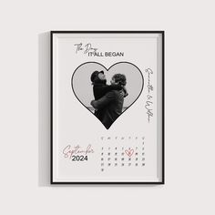 a calendar with a heart shaped photo and the date for two people to share it