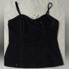 Check Out This Gorgeous New Old Stock Black Beaded Corset Top With Adjustable Straps And A Sexy Zip Up Back. Fully Lined And Silky Smooth. Size Medium. Straps Are Removable As Well. Never Worn. Tags Attached And Comes With Replacement Beads. 16.25" Armpit To Armpit 16" Total Length Not Including Adjustable Straps Smoke Free Home Fast Shipping Elegant Embellished Summer Corset, Elegant Summer Embellished Corset, Summer Embellished Corset For Night Out, Embellished Sleeveless Corset, Embellished Elegant Corset For Night Out, Elegant Embellished Corset For Night Out, Embellished Black Corset For Night Out, Black Sequined Corset, Black Embellished Corset For Night Out