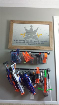 Protect This House - Nerf Gun Rack Nerf Storage, Diy Toy Storage, Boys Playroom, Boy Bedroom, Toy Rooms, Big Boy Room, Boys Bedrooms, Boy's Bedroom, Kids Playroom