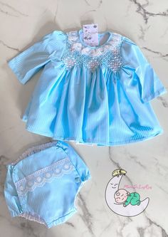 Handmade Blue dress. Smocked Hand Embroidered. Diaper cover. Blue Sets For Spring Daywear, Blue Long Sleeve Smocked Top For Spring, Blue Embroidered Sets For Spring, Blue Smocked Top For Summer Daywear, Fitted Blue Dress With Smocked Back, Blue Smocked Bodice Top For Spring, Blue Smocked Bodice Top For Daywear, Blue Long Sleeve Smocked Dress For Summer, Blue Smocked Top With Smocked Back For Spring