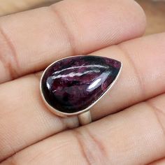 Pear Eudialyte Ring, Pear Stone Ring, Statement Ring, Gemstone Cabochon, 925 Sterling Silver, Birthday Gifts, Christmas Sale, Etsy Sale,Boho Description : Gemstone : Eudialyte Metal : 925 Sterling Silver Stone Shape :- Pear Stamp :- 925 Weight : 6.53 Gram Approx Stone Size : 23 x 15 MM Approx handmade Item Made to order **This ring you will receive may vary from the image as no two gemstones are similar and images cannot define exact product definitions. ** Shipping Policy:- We mainly use UPS , Silver Pear-shaped Gemstone Jewelry, Teardrop Sapphire Ring In Sterling Silver Gift, Teardrop Sapphire Ring In Sterling Silver, Sterling Silver Teardrop Crystal Gemstone Ring, Pear-shaped Tourmaline Jewelry As A Gift, Pear-shaped Cabochon Ring As Gift, Pear-shaped Sapphire Ring In Sterling Silver, Sterling Silver Pear-shaped Gemstone Ring, Sterling Silver Pear-shaped Polished Jewelry