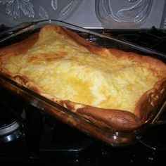 a casserole dish sitting on top of a stove