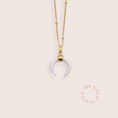 Elevate your style with this exquisite Crescent Moon Pendant made with sustainably sourced cow bone, crafted with high quality recycled 925 sterling silver with 18k gold plating. ------ D E T A I L S ------ * Material: 925 sterling silver with 18k gold plating * Safe for sensitive skin * Hypoallergenic, lead and nickel-free * Handcrafted in collaboration with artisans in Indonesia and India * Made with sustainable recycled materials  ------ D E L I V E R Y ------ All deliveries are done through White Moon Phase Necklace, Dainty White Moon-shaped Jewelry, Everyday White Jewelry With Moon Charm, Everyday White Moon Charm Jewelry, White Moon Charm Necklace, White Sterling Silver Necklace With Moon Charm, White Dainty Jewelry With Moon Charm, Dainty White Necklace With Moon Charm, Dainty White Moon Phase Necklaces