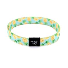 "Who lives in a pineapple under the sea? You can...with this yellow pineapple band! Get ready to make waves with these beachy bracelets! Super comfy on your wrist and they keep their vibrant colors all summer long. Stack them up, mix and match with our knotband bracelets. Available in bracelet lengths (L): Extra Small approx 5.5\" L Small approx 6.5\" L Medium approx 7.5\" L Reversible surf, music and beachy prints. Elastic blend material, can stretch to desired fit. Packaged in natural drawstri Adjustable Stretch Bracelet For Summer Vacation, Casual Stretch Bracelet For Beach In Spring, Casual Stretch Bracelet For Beach And Spring, Adjustable Multicolor Wristband For Summer, Yellow Casual Jewelry For Vacation, Casual Yellow Jewelry For Vacation, Adjustable Summer Beach Wristband, Adjustable Wristband For Beach In Summer, Adjustable Wristband For Summer Beach