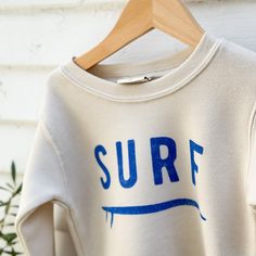 Spun from plush sponge fleece fabric Remarkably soft unisex pullover Featuring ribbed cuffs and waistband, a crew neck, and fashion-forward fleece fabrication. Hand printed with water based ink. Water Based Ink, Fleece Fabric, Fashion Forward, Surfing, Crew Neck, Sweatshirts, Water, Fabric