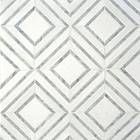 a white and grey tiled wall with lines