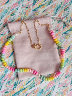 Indulge in some sweet summertime vibes with our Summer Candy Necklace. Handmade with colorful and bright beads, this necklace is the perfect accessory to add a touch of sunshine to any outfit. Plus, it's made with gold-filled materials for a bright and luxurious finish. Get ready to make a statement with this playful a Handmade Rainbow Necklaces For Everyday Wear, Handmade Rainbow Necklaces For Everyday, Handmade Rainbow Necklace For Everyday, Trendy Gold Beaded Necklaces With Lobster Clasp, Trendy Gold Beaded Necklace With Lobster Clasp, Playful Pink Necklace For Everyday, Gold Beaded Necklaces With Colorful Beads For Everyday, Trendy Gold Necklace For Vacation, Playful Colorful Beaded Necklaces For The Beach