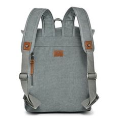 Introducing the Discovery Backpack: Classic design meets modern versatility. Crafted from durable cotton canvas and genuine leather. Eco-conscious with recycled hardware and vegetable-based dyes. Features padded laptop compartment and adjustable shoulder straps for comfort. Dimensions: W: 12" H: 17" D: 5.5". Handle drop: 3". Strap drop: 24". An artisanal masterpiece for the adventurous spirit. | TSD Brand Discovery Backpack, Teal Eco Conscious, Shoulder Straps, Classic Design, Cotton Canvas, Genuine Leather, Laptop, Backpacks, Canvas, Leather