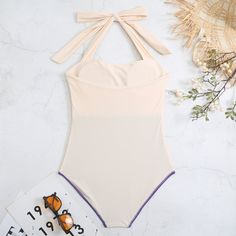 Product detailsName: Women Bathing SuitGender: WomenMaterial: PolyesterCollar: Halter NeckSleeve length: SleevelessPattern: Contrast ColorSize: S/M/L/XLPackage Contents1 x Bodysuit SwimsuitsPromiseIf the product has any quality problems, please feel free to contact us, we will help you solve the problem as quickly as possible.Size Chart: Beachwear Sleeveless Bodysuit With Lined Body, Spring Sleeveless Nylon Bodysuit, Beige Sleeveless Swimwear For Beach Season, Summer Sleeveless Nylon Swimwear, Sleeveless Beige Swimwear For Summer, Beige Sleeveless Swimwear For Spring, Sleeveless Solid Color Lined Swimwear, Summer Sleeveless Lined Bodysuit, Sleeveless Stretch Beachwear Bodysuit