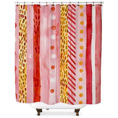 a shower curtain with red, yellow and white stripes on the bottom is an abstract design