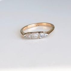 An Art Deco 9 carat gold five stone diamond ring. The setting holds the five cut stones up high beautifully letting them sparkle! CONDITION: Wear consistent with age and use. Please see photos for more detail. HALLMARKED 9 CARAT GOLD BAND WIDTH: 1.5mm SETTING SIZE: 13mm x 3.5mm STONE SIZE (IN ORDER):  .01 carats .02 carats .05 carats .02 carats .01 carats RING SIZE: UK: M 1/2 | US: 6 1/2 WEIGHT: 2.1g (PB) Onyx Signet Ring, Stone Diamond Ring, Gold Enamel, Multi Stone Ring, Gold Band, Perfect Ring, Pearl Ring, Gold Style, Gold Bands