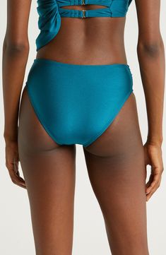 A draped, high waist sweetly shapes these bikini bottoms styled with a classic fit, versatile solid hue and moderate back coverage. Moderate back coverage Lined 82% nylon, 18% spandex Hand wash, dry flat Imported Solid Color High Waist Swimwear With Wide Waistband, Solid High-cut Leg Bottoms For Beach Season, Solid High Waist Seamless Swimwear, Solid Color High Waist Seamless Swimwear, Solid High-waist Seamless Swimwear, High Waist Seamless Beach Bottoms, Solid High Waist Stretch Swimwear, High-cut Leg Swimwear, Seamless High Waist Bottoms For Beach Season