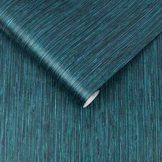 a blue and green wallpaper with vertical stripes on the fabric, which is very soft