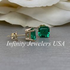 "The stud earrings pictured are lab created emerald #5519. Also shown in white gold. Earring back style is subject to change due to availability. -Approximate total carat weight: 2.00ctw. -Center Stone Size: 6x6mm - approx. 1.00ct each diamond equivalent -Center Stone Shape: Asscher cut -Gem Type: lab created emerald -Stone Clarity: VS2 -Stone Color: lively medium green, eye-clean -Moh's Scale: 8.5 hardness -Metal Type and Purity: 14k yellow gold -Setting: 4 prong basket head -Backing: friction Emerald Birthstone Earrings For Anniversary, May Birthstone Earrings For Anniversary, Green Earrings For Anniversary, Emerald Studs, Emerald Earring, Emerald Stud Earrings, White Gold Earring, Emerald Earrings Studs, Lab Created Emerald