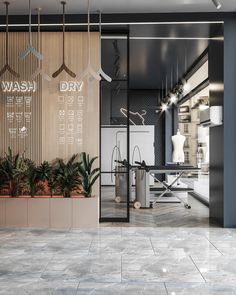 the inside of a store with plants and decorations