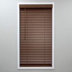 a window with brown blinds in it