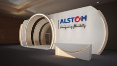 the logo for alstomm is displayed in front of a wall with curved shapes