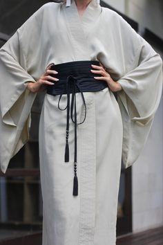 Wide obi belt in Japanese style. One size, fits waist from 55cm to 100cm *if you want a belt of a different color, please write to us ◆ MATERIAL: - the belt is made of soft linen/rayon Tassels: - Stones: black smooth onyx/black smooth obsidian + high-strength nylon thread black color (if you want to add a thread of another color write us a personal message to clarify the details) ◆ PRODUCT DETAILS: - Wide ~ 15 cm - Belt length ~ 85 cm - Total length with ties ~285 cm 2 tassel: - 6 pcs stone bead Obi Belt Outfit, Belt Knots, Belt Kimono, Tassel Belt, Black Kimono, Obi Belt, Wrap Belt, Style Japonais, Belt Design