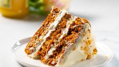 a piece of carrot cake on a white plate