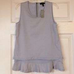 Nwt J Crew Ruffle Tank Top Shirt Size: Xxs Color: Lavender Bust 16” Length 23” Chic Lavender Tops With Ruffles, Chic Lavender Top With Ruffles, Chic Lavender Ruffled Top, Lavender Ruffled Tops For Spring, Spring Lavender Ruffled Tops, Sleeveless Lavender Ruffled Top, Lavender Tops For Spring Layering, Purple Top For Spring Layering, Lavender Ruffled Top For Summer