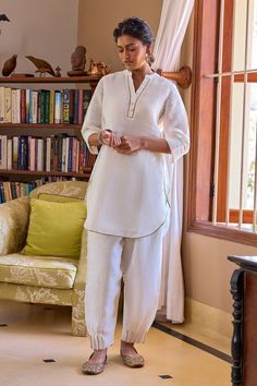 Minimal, comfortable, and chic, the Neroli Kurti is designed to bring light and warmth in the lives of all those around you. This gauze linen short kurta features gota work on the edges and can be dressed up or down depending on the occasion. Spring Linen Kurta With Chikankari Embroidery, Festive White Linen Sets, Linen Straight Kurta Set For Summer, Summer Linen Straight Kurta Set, Summer Linen Sets With Straight Kurta, Long Sleeve Linen Kurta With Chikankari Embroidery, White Linen Straight Kurta, Traditional White Linen Sets, Summer Linen Kurta With Chikankari Embroidery