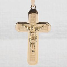 This iconic crucifix is elevated to a new level and meaning. Crafted in stainless steel and lavishly plated in 18k yellow gold. This timeless traditional style features engraved upon it, the Lord’s Prayer ‘Padre Nuestro’. A unique an elegant look to represent your faith. Gold Crucifix Cross Necklace In Stainless Steel, Gold Stainless Steel Crucifix Cross Necklace, Gold Stainless Steel Crucifix Necklace, Gold Engraved Crucifix Cross Necklace, Classic Gold Crucifix Cross Necklace, Engraved Gold Crucifix Necklace, Gold Engraved Crucifix Necklace, Luxury Gold Crucifix Cross Necklace, Gold Crucifix Cross Necklace With Polished Finish