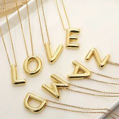 So Excited About These Awesome Necklaces Coming In. These Charming, On Trend Balloon Letter. Necklaces Are A Great Gift For Any Occasion And Can Be Worn Every Day. The Pendant And 18 Inch Chains Are Silver And Gold Plated. In Silver I Have: A E L And M Letters. In Gold I Have 2 As 3ls One H And One M. But One Give One To Charity. Spend $45 And Over From My Shop, I Will Give You A Free Gift-Dangle Valentine’s Day Earrings (Valued At $25). Gold Metal Necklaces For Birthday, Personalized Silver Necklaces For Party, Personalized Silver Necklace For Party, Silver Necklaces For Mother's Day Party, Silver Initial Necklace For Birthday, Silver Letter Necklace For Anniversary, Silver Initial Pendant Party Jewelry, Silver Initial Pendant Jewelry For Party, Silver Initial Metal Necklaces