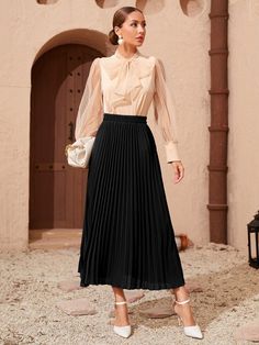 Luxury Traditional Black Skirt, Luxury Elegant Skirt For Holidays, Luxury Formal Skirt For Fall, Chic Luxury Pleated Skirt, Luxury Pleated Long Skirt, Chic Luxury Skirt For Day Out, Luxury Feminine Skirt For Fall, Evening Pleated Skirt, Black Fall Skirts