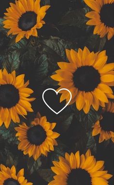 sunflowers with a heart in the middle and an image of a white heart on top