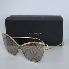 Dolce & Gabbana Sunglasses 100% Uv Protected Color Options: Gold/Grey Style: Butterfly Frame: Metal Lens: Grey With Gold Print Category 2 Filter Adjustable Nose Pads Includes: Original Brand Name Case, Cleaning Cloth And Paperwork Dimensions: Lens 70 Mm X Bridge 20 Mm X Arms 145 Mm Made In Italy Due To Light And Computer Tolerance, Glasses Color May Be A Little Different From The Actual Item. 100% Authentic Model Is Wearing The Same Sunglasses In Different Color. Questions? Leave A Comment Below! Authentic Models, Dolce Gabbana Sunglasses, Butterfly Frame, Gold Print, Grey Fashion, Sunglasses Case, Sunglasses Accessories, Dolce And Gabbana, Women Accessories