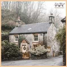 an old stone house in the country side