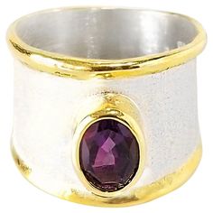 Yianni Creations Midas Collection 100% Handmade Artisan Ring from Fine Silver with a layover of 24 Karat Yellow Gold features 1.75 Carat Amethyst complemented by unique techniques of craftsmanship - brushed texture and nature-inspired liquid edges. The core of this beautiful classic, wide-band-shaped ring is made from Fine Silver 950 purity, which is plated with Palladium, to protect the ring from the elements. The Gold rims are created by 24 Karat Yellow Gold Plate. This overlay has an unusual Single Stone Engagement Rings, Contemporary Engagement Rings, Amethyst And Diamond Ring, Wide Band Ring, 24 Karat Gold, Artisan Rings, Contemporary Ring, Ringe Gold, Gold And Silver Rings