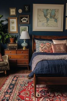 a bed sitting in a bedroom next to a dresser and lamp on top of a rug