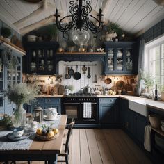 a kitchen with blue cabinets and wooden floors