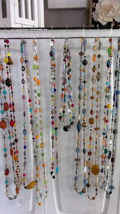 Each of these necklaces is carefully handmade with beautifully diverse and high-quality glass beads, some of which are hand painted, twisted, edged, faceted and finished with tiny seed beads in between. 😱😳 Every design is one-of-a-kind, with something that makes her extra unique: metal accents, large accent beads, color theme, single or double stranded. Some are color-themed but all are completely made of glass down to the tiny seed beads.   Just beautiful! Unless otherwise noted, every necklace is a single strand that can easily be doubled. Czech Glass Beaded Necklaces With Round Beads For Festival, Artisan Glass Beaded Necklaces For Festivals, Handmade Artistic Beaded Necklaces, Bohemian Style Crystal Necklaces With Faceted Beads, Spiritual Glass Beaded Necklaces For Festivals, Artsy Adjustable Beaded Necklaces With Round Beads, Adjustable Artsy Beaded Necklace With Round Beads, Artistic Handmade Beaded Necklaces With Round Beads, Colorful Czech Glass Beaded Necklaces For Gifts