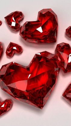 many red diamonds are arranged in the shape of hearts