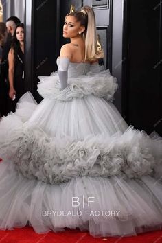 lady in white gown on the red carpet