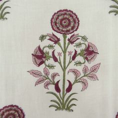 an embroidered piece of cloth with flowers and leaves on the side, in pinks and greens