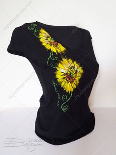 ♥Hand Painted Tshirt, Sunflowers T-shirt, SUNFLOWER Top, Hanpainted Floral TSHIRT, Summer Hand Painted Sunflowers T Shirt, Woman's t shirt♥ HAND PAINTED T-SHIRT by DiqnaDesign. Because these are Original Hand Painted Designs I will not guarantee that each t-shirt is exactly the same. The nature of hand painted designs is that each one is just a little different. ------- SIZE & DETAILS ------- Cotton T-shirts - hand painted with professional water resistant textile paint Available sizes: S, M Artistic Black Tops For Spring, Artistic Cotton Floral Print Tops, Artistic Cotton Tops With Floral Print, Artistic Cotton Top With Floral Print, Artistic Hand Painted Cotton Top, Hand Painted Short Sleeve Cotton Top, Hand Painted Cotton Short Sleeve Top, Hand-painted Crew Neck Tops For Summer, Hand Painted Crew Neck Tops For Summer