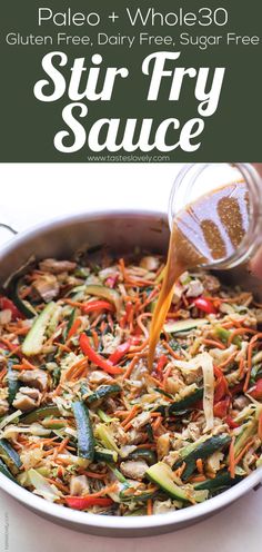 a pan filled with stir fry vegetables and sauce being poured into the skillet to make stir fry