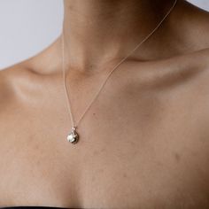 Embrace the gentle healing power of the sea with the soothing energy of Mother of Pearl. Our Keeper Necklace is crafted to hold its essence close to your heart, offering a constant source of comfort and serenity. Nestled delicately within the organically shaped three-pronged Keeper pendant, the Mother of Pearl radiates its tranquil aura. Technically known as "nacre," this crystallized mineral compound forms on the inner shell layer of select mollusks. Saltwater oysters, abalone, and freshwater m Healing Power, Healing Powers, Emotional Healing, Love Symbols, Silver Roses, Necklace Silver, Earring Necklace, Jewelry Care, Personal Growth