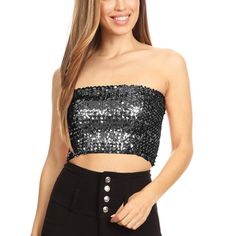 Step into the spotlight with the Anna-Kaci Women's Strapless Glitter Sequin Sparkle Bandeau. This eye-catching tube top is your ticket to a glamorous evening.

- Size: Large/X-Large
- Color: Black
- Material: Features all-over sequin embellishments
- Gender: Female
- Age Group: Adult

Designed for both comfort and style, its crop length paired with a stretch fit allows you to dance the night away with ease. Perfect for any party or evening event, this bandeau ensures you shine with every move. Sequin Sleeveless Tube Top For Evening, Sleeveless Sequin Tube Top For Evening, Bandeau Tube Top For Night Out, Fitted Glamorous Bandeau Tube Top, Glamorous Bandeau Crop Top For Night Out, Glamorous Fitted Bandeau Tube Top, Flirty Strapless Tube Top For Club, Flirty Strapless Tube Top For Night Out, Strapless Sequined Crop Top For Summer