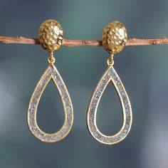 Step into glamor with these breathtaking dangle earrings by India's Shivani Choudhary. Crafted from 18k gold-plated sterling silver, these sophisticated earrings feature a hollow drop design studded with luminous labradorite chips. Suspended elegantly from an oval structure boasting intricate hammered textures, they promise to elevate your style to new heights. Sophisticated Earrings, Lion Pendant, Drop Design, Sterling Silver Necklace Pendants, Gold Texture, Jewelry Packaging, Silver Pendant Necklace, Jewelry Gift Box, Gold Plated Sterling Silver