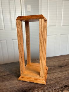 a small wooden stand on top of a table