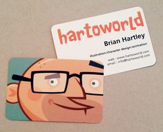 a close up of a business card with a cartoon character on it's front