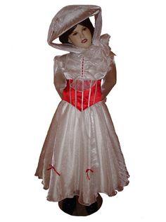 a mannequin dressed in a dress and bonnet