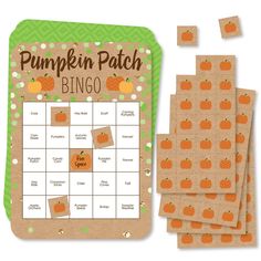 the pumpkin patch bingo game is next to several pieces of paper